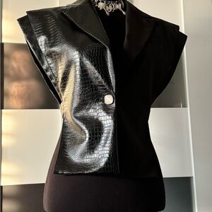 Faux leather/ polyester printed vest.